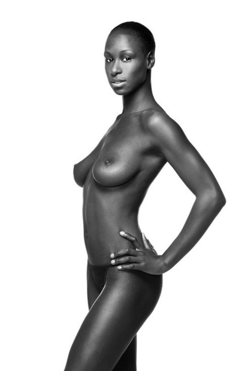 Beautiful, dark-skinned, perky black breasts.