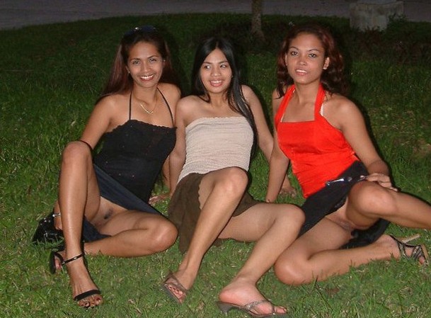 Three lesbian Asian having an outdoor party